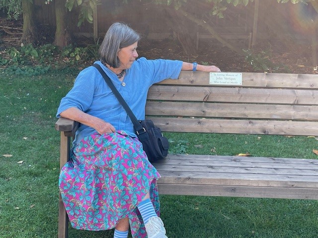 Lady sitting on bench